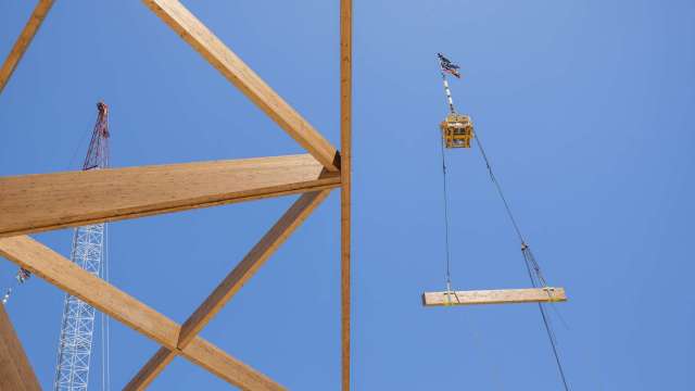 Final roof timber beam is installed news post thumbnail