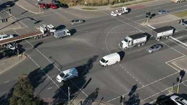 image of traffic moving through intersection